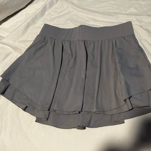 Light purple golf squort with phone pocket